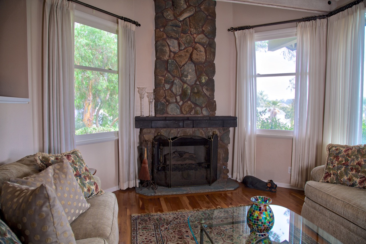 Living Room with Rustic Fireplace